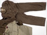 a brown jacket and pants sitting on a white surface
