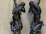 pair of antique french bronze figurines of a woman and a boy