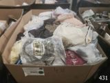 a box full of clothes and other items in it