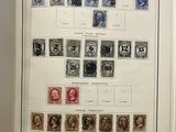 an open book with a bunch of stamps on it