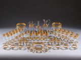 a lot of glasses that are sitting on a table