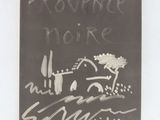 a black and white picture of a book with writing on it