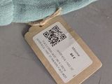 a tag that is attached to a piece of cloth