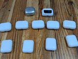 a group of electronic devices sitting on a wooden table