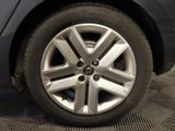 a close up of a tire on a car ' s rim