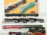 a lot of toy trains that are sitting on a table