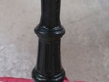 a black and white chess piece on a red table cloth
