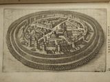 an old book with a drawing of a city on it