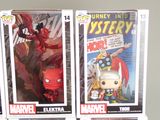 several different marvel action figures are on display in a display case