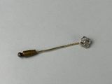 an image of a pin with a bead on it