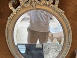 a man taking a picture of himself in a mirror
