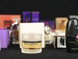 a lot of perfume bottles that are on a table