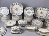 a lot of plates that are sitting on a table