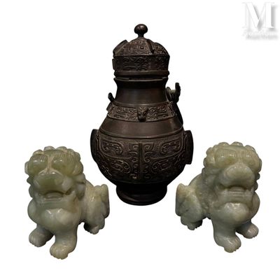 three statues of lions and a urn on a white background