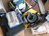 a pile of assorted items sitting on the floor