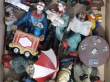 a box full of clown figurines that are in it