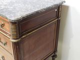 a marble top desk with a marble top on wheels