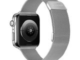 an image of a silver apple watch with a stainless steel band