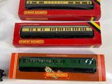 three toy trains are sitting on a table next to each other