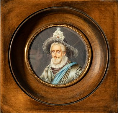 une vieille photo d'un homme portant un chapeau et une barbe