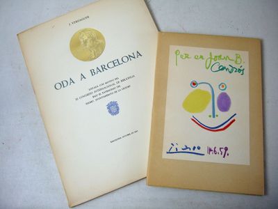 an old book with a picture of a woman on it and a book with a picture of a woman on it