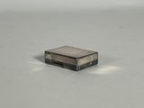 an image of a miniature radio sitting on a table