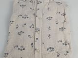 an image of a close up of a small bag with a flower pattern