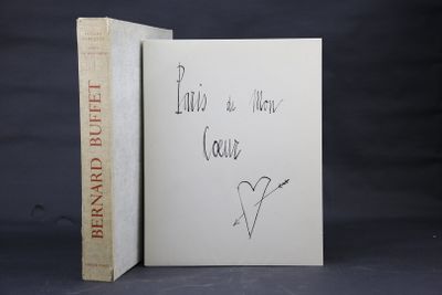 a book with a drawing of a heart on it and a book with a drawing of a heart on it