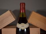 a bottle of wine that is sitting on a table