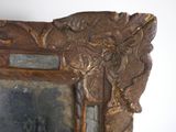 a picture of a mirror with a decorative design on it