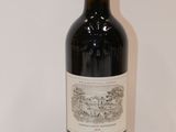 a bottle of wine that is sitting on a table