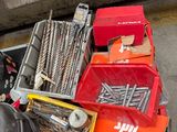 a pile of assorted tools and tools on the ground