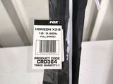 a black umbrella with a price tag on it