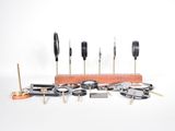 a lot of tools that are sitting on a table