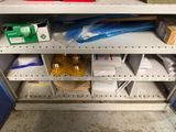a shelf with many items on it in a room