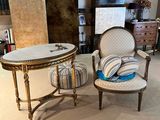 two chairs and a table in a room