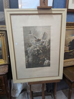 une photo d'un tableau posé sur un chevalet dans une pièce
