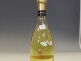 a bottle of wine that is sitting on a counter