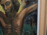 a painting of a man with a cross on his chest