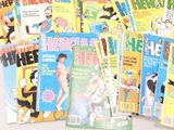 a lot of comic books that are on the table
