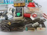 a lot of toy train tracks on the table