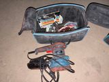 an image of a tool bag with tools inside of it