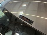 a sticker on the hood of a car that says tatoo