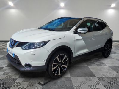 the white nissan qx suv is parked on a checkered floor