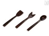 three wooden spoons and a spatula sitting next to each other