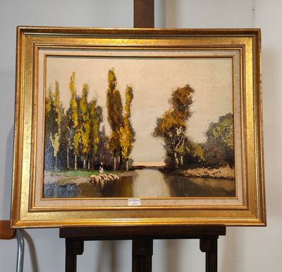 une image d'un tableau sur un chevalet dans une pièce