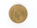 a gold coin with an indian head on it