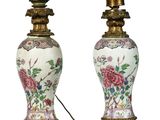 pair of chinese vases with flowers and birds on them on a white background