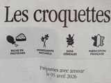 a sign on the side of a building advertising a croquet shop