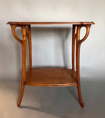an image of a wooden table with a shelf underneath it
